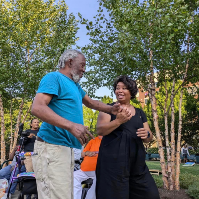 Cottages of Clayton Resident Dancing